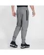 Pantalon homme M NSW TCH FLC JGGR Gris