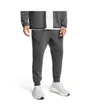 Pantalon de survetement Homme UA UNSTOPPABLE FLC JGR EU Gris