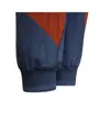 Un pantalon de survêtement tissé sport conçu en matériaux recyclés. Enfant B CB