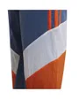 Un pantalon de survêtement tissé sport conçu en matériaux recyclés. Enfant B CB